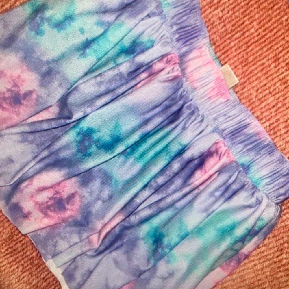 Features playful blend style skirt